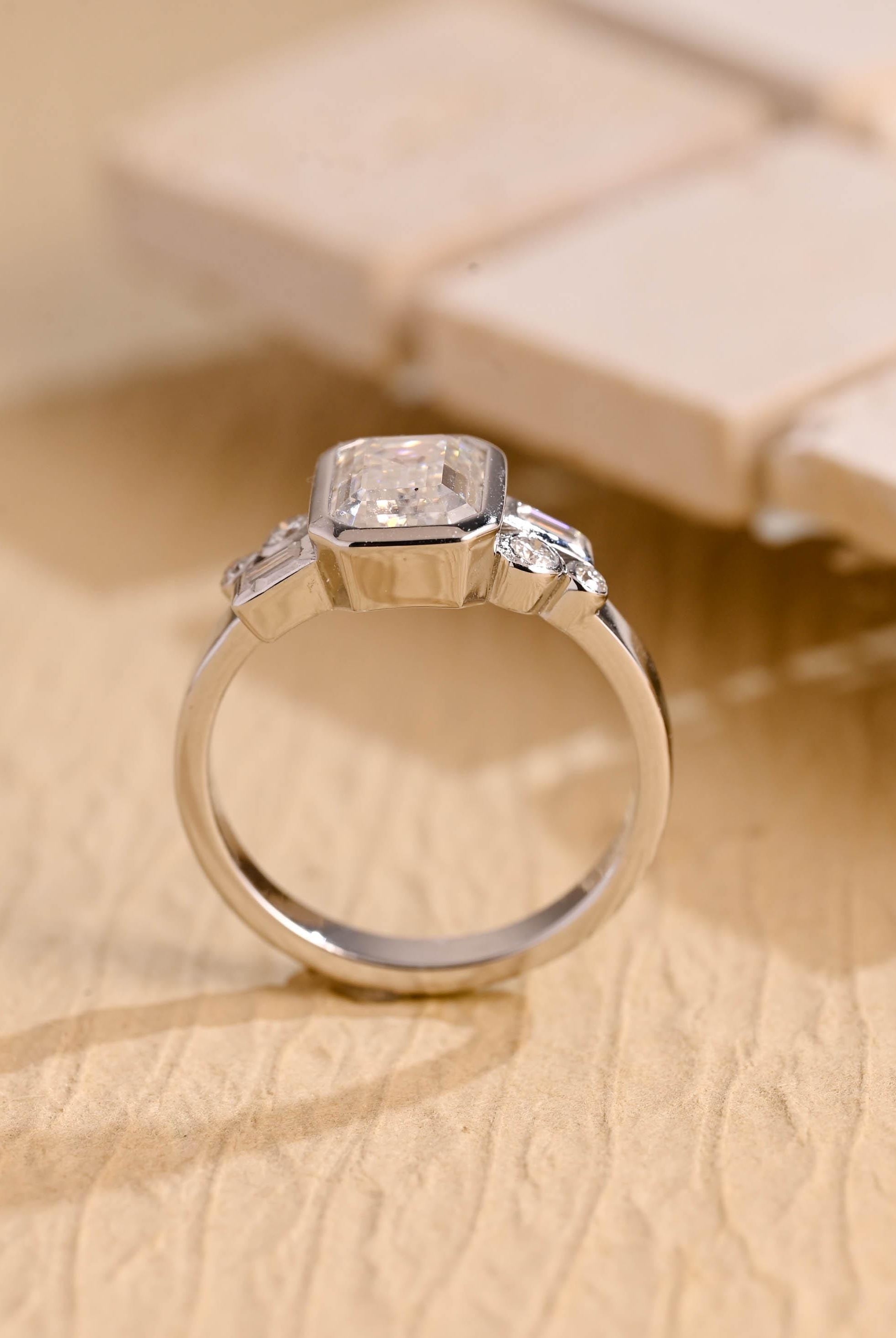 bridal emerald cut bezel cluster engagement ring USA