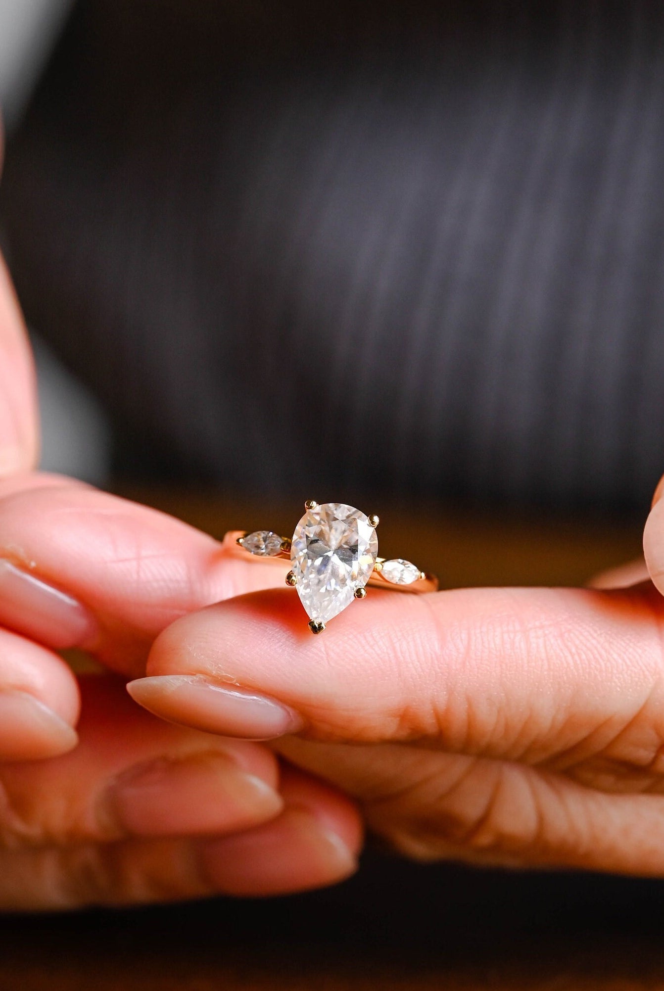 best pear cut three stone moissanite engagement rings 2026