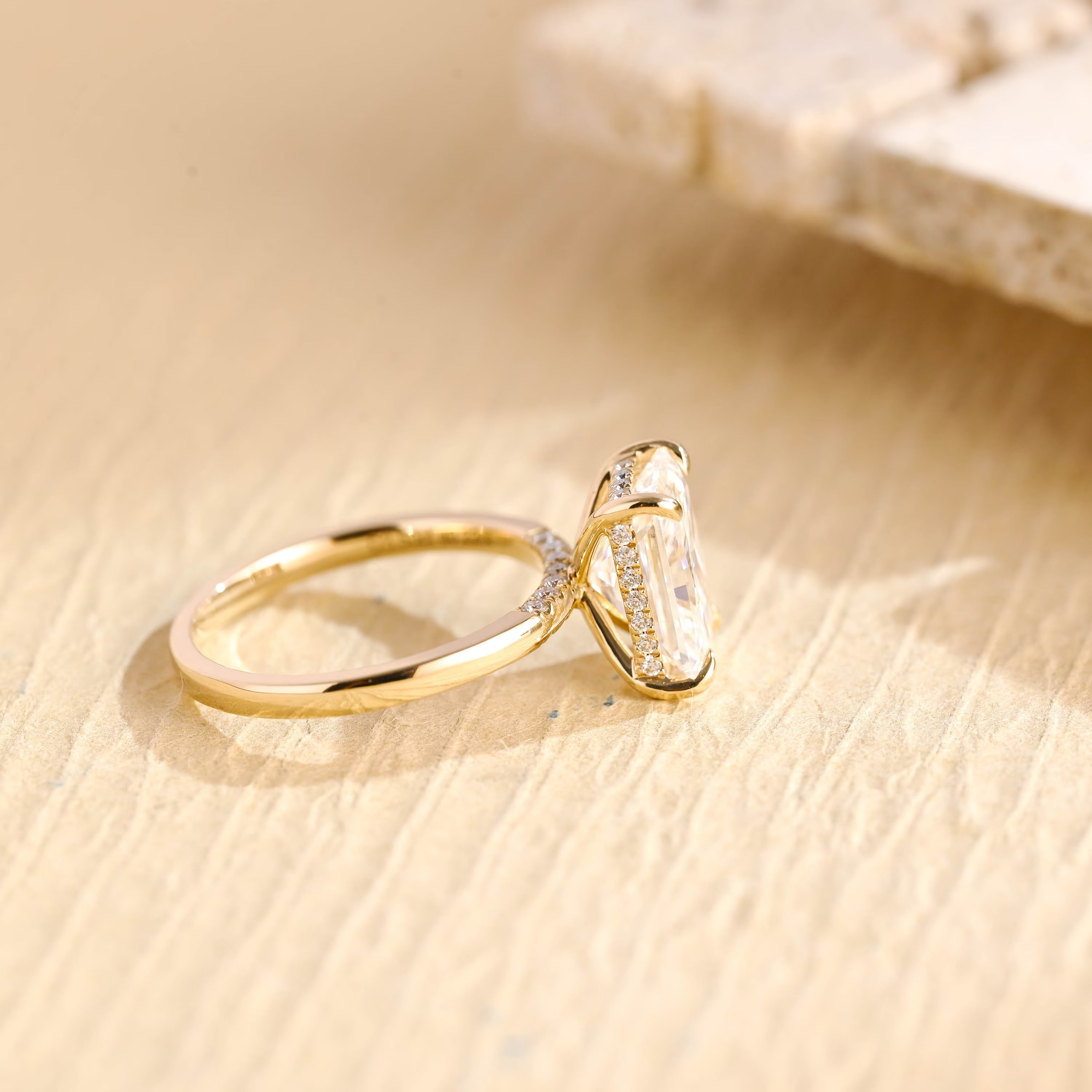 gold hidden halo moissanite engagement ring radiant cut
