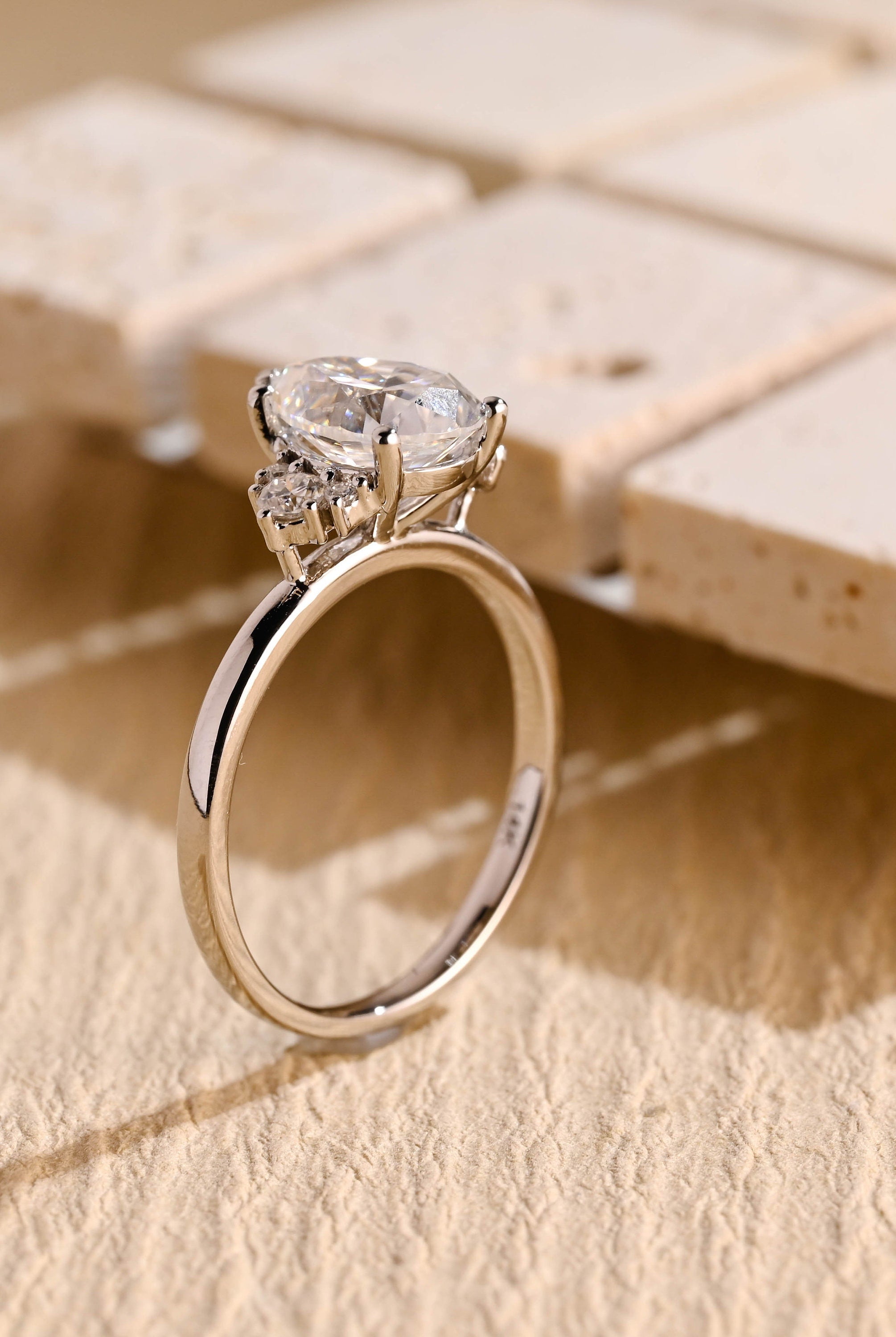 designer pear moissanite engagement ring