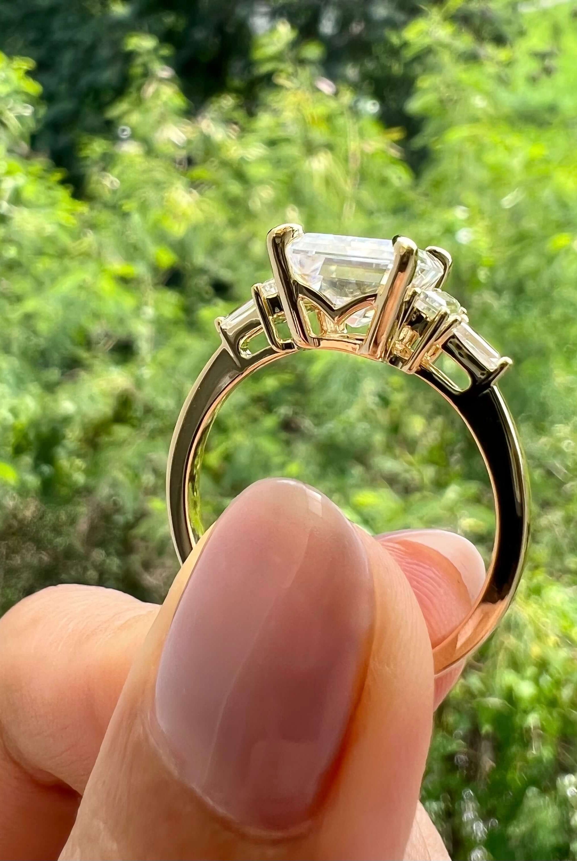 5-75-ct-emerald-cut-3-stone-moissanite-engagement-ring