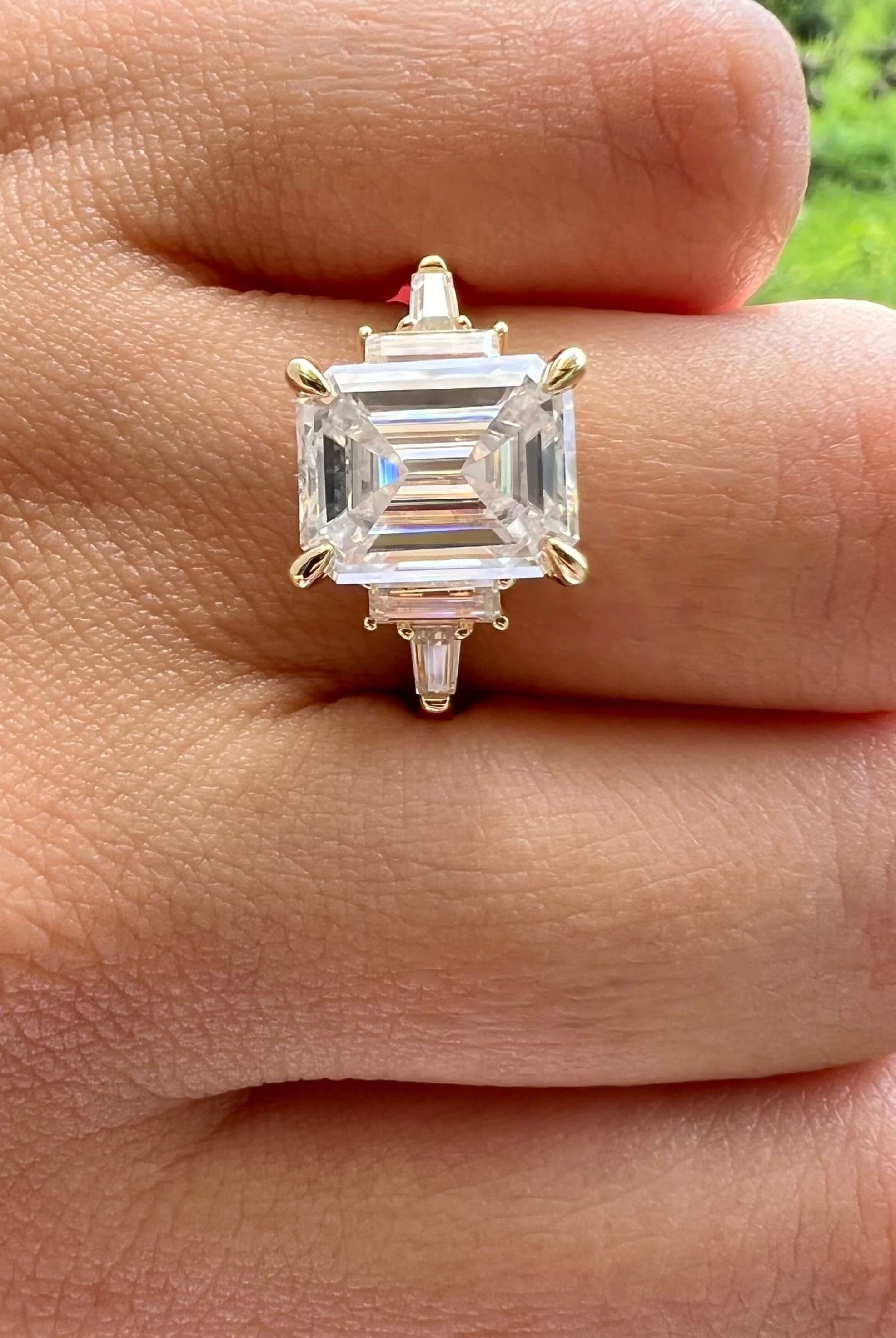 emerald-cut-3-stone-moissanite-engagement-ring