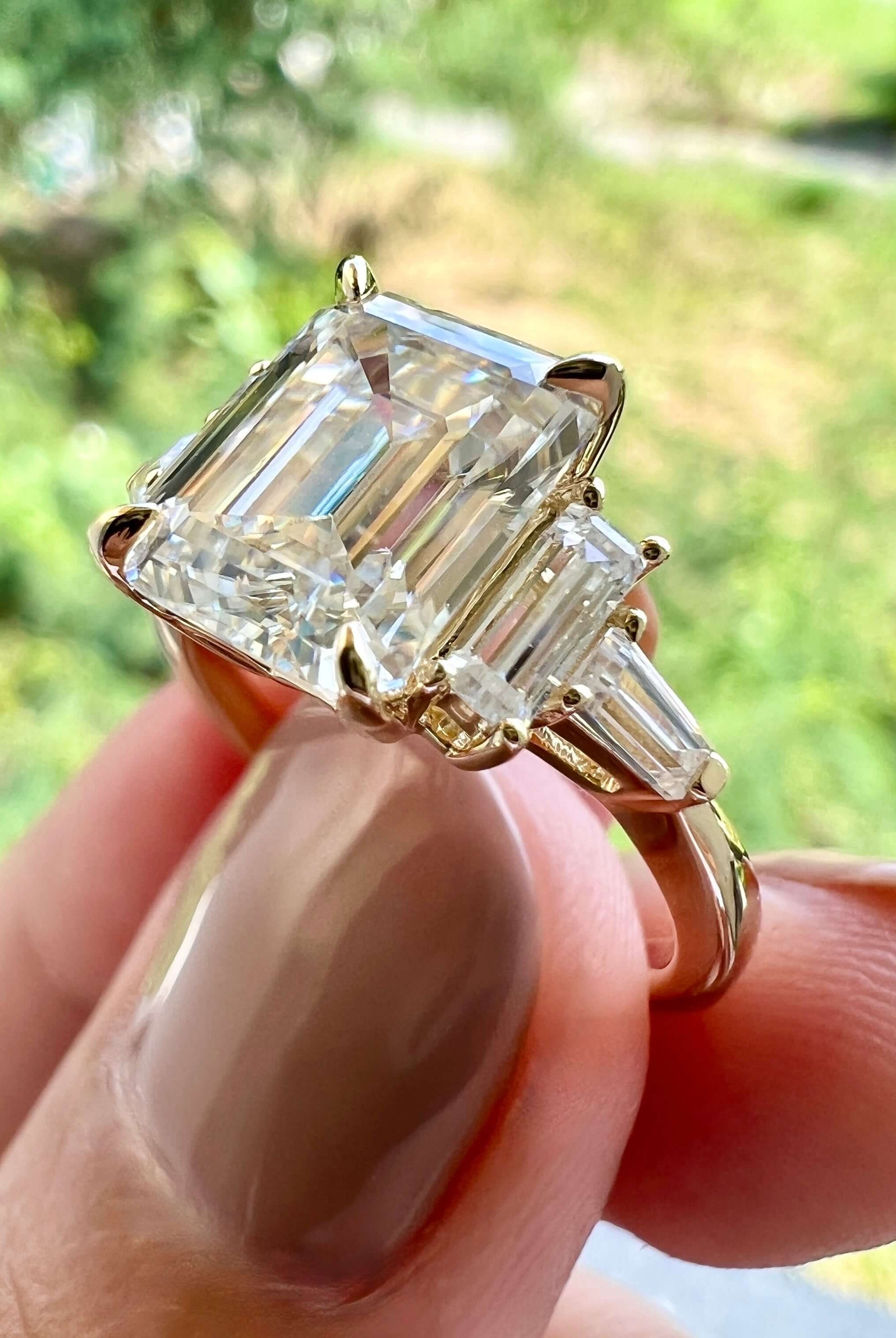emerald-cut-3-stone-moissanite-engagement-ring
