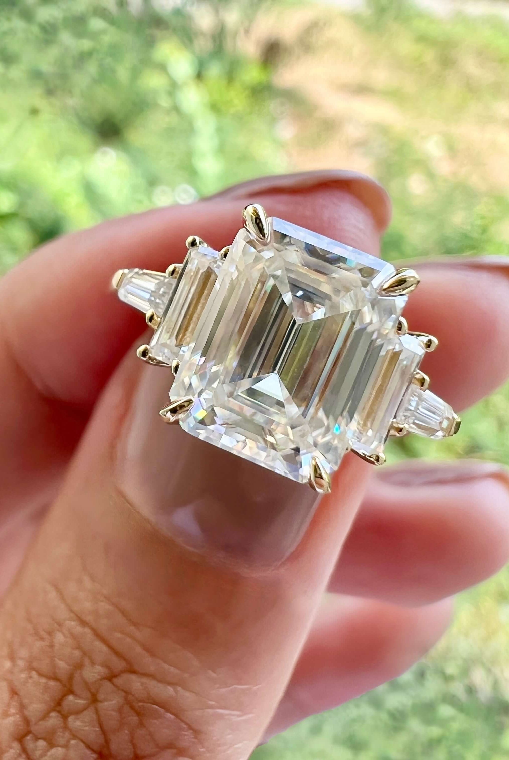 emerald-cut-3-stone-moissanite-engagement-ring