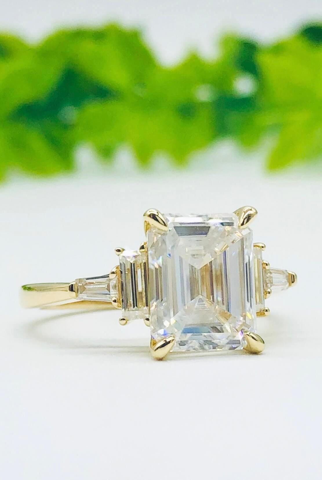 5-75-ct-emerald-cut-3-stone-moissanite-engagement-ring