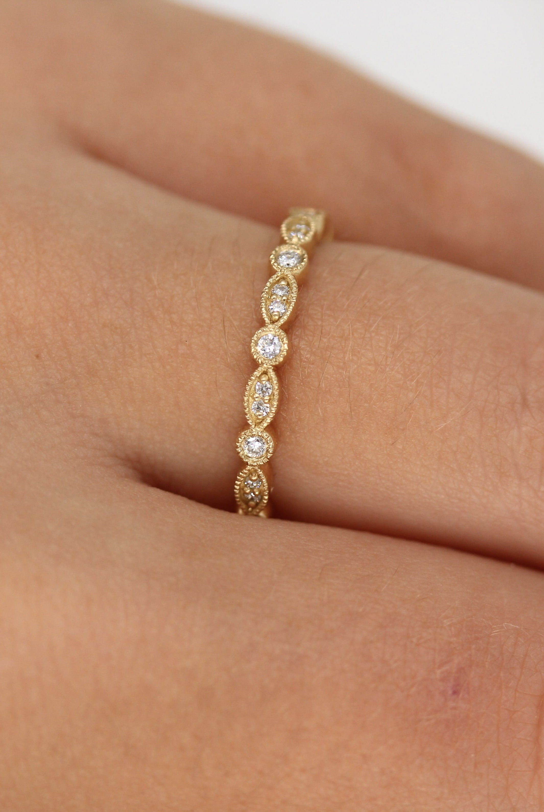 round-cut-milgrain-style-moissanite-wedding-band