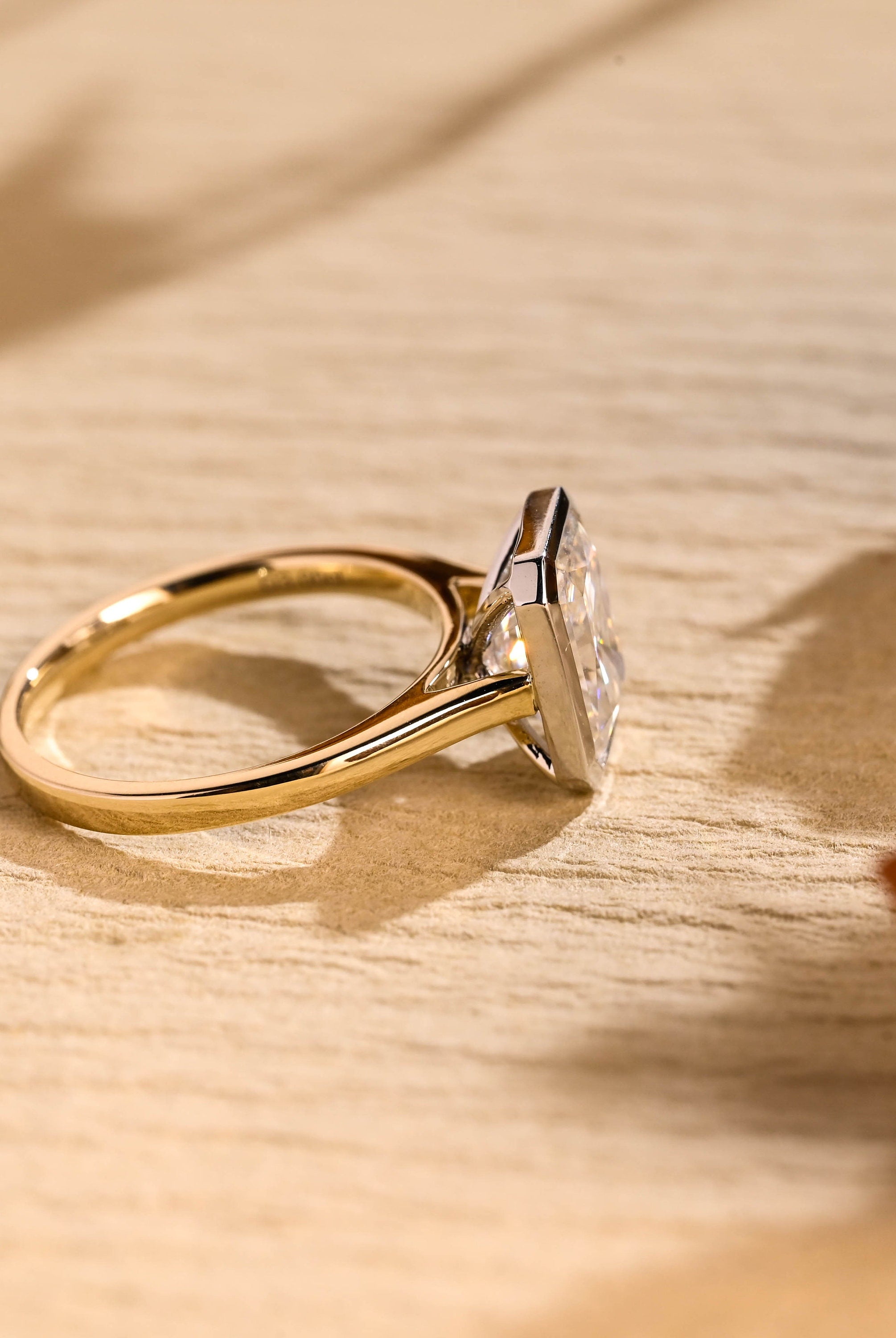 elegant bezel solitaire engagement ring moissanite