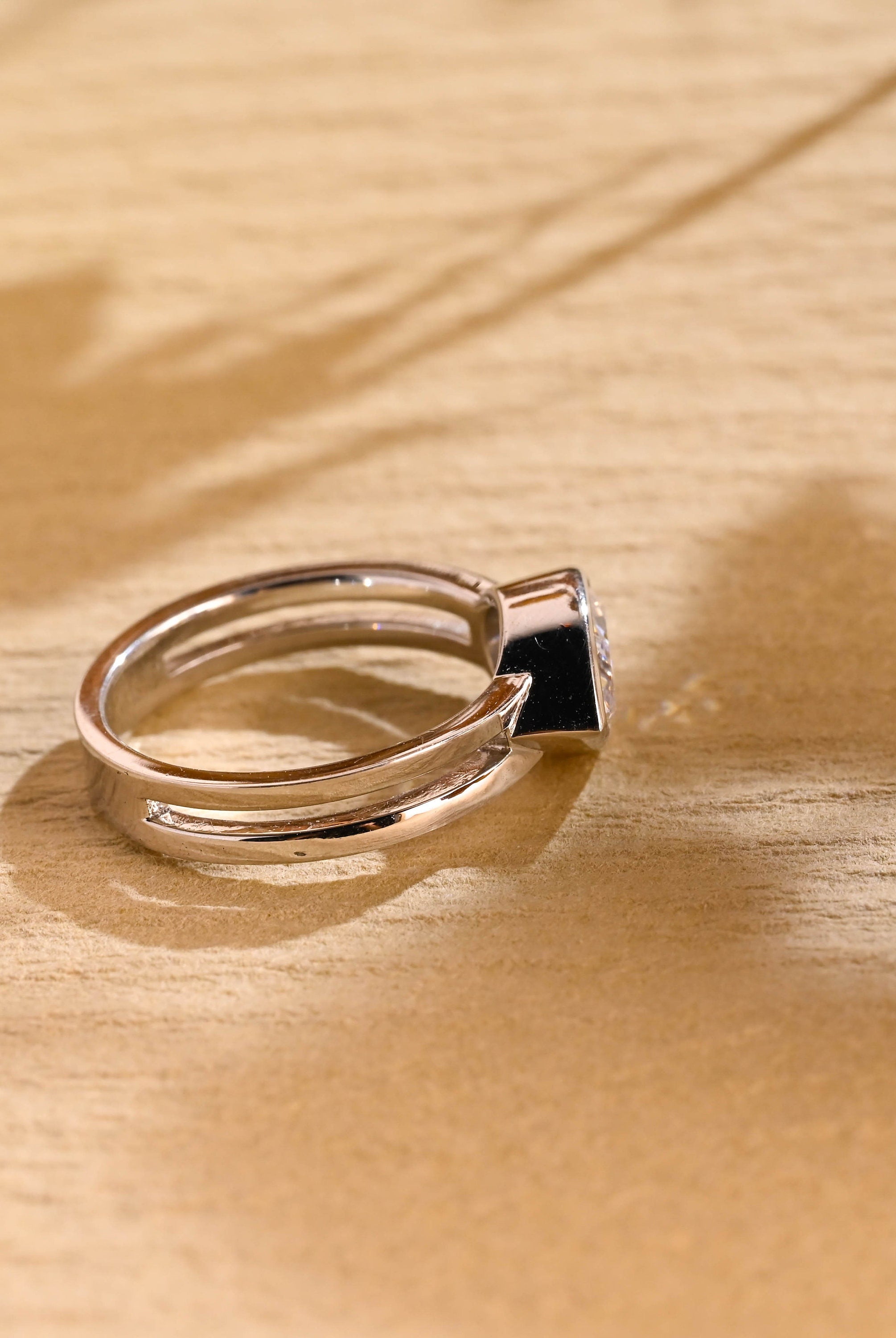 affordable luxury pear bezel engagement ring moissanite