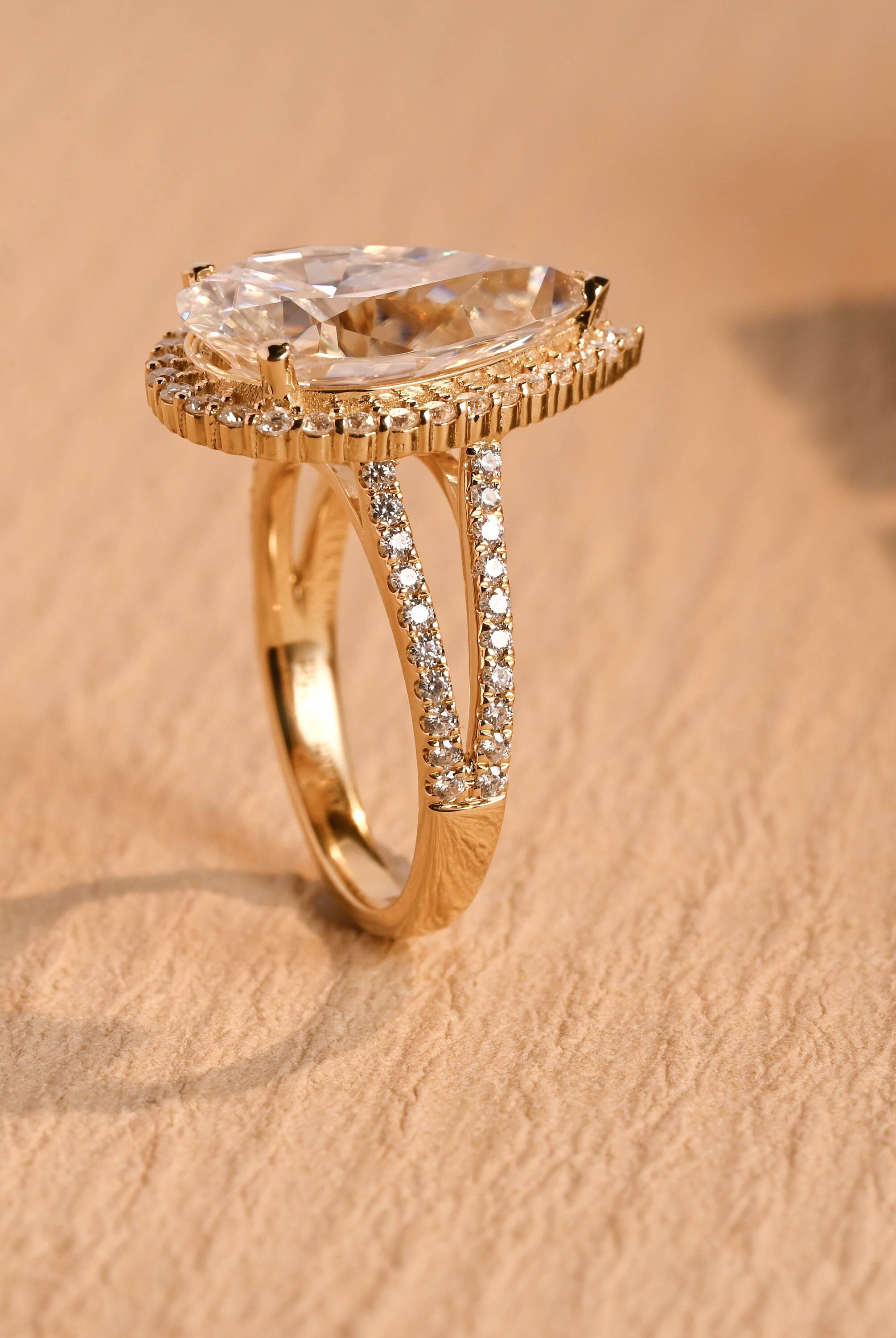 pear cut moissanite halo engagement ring