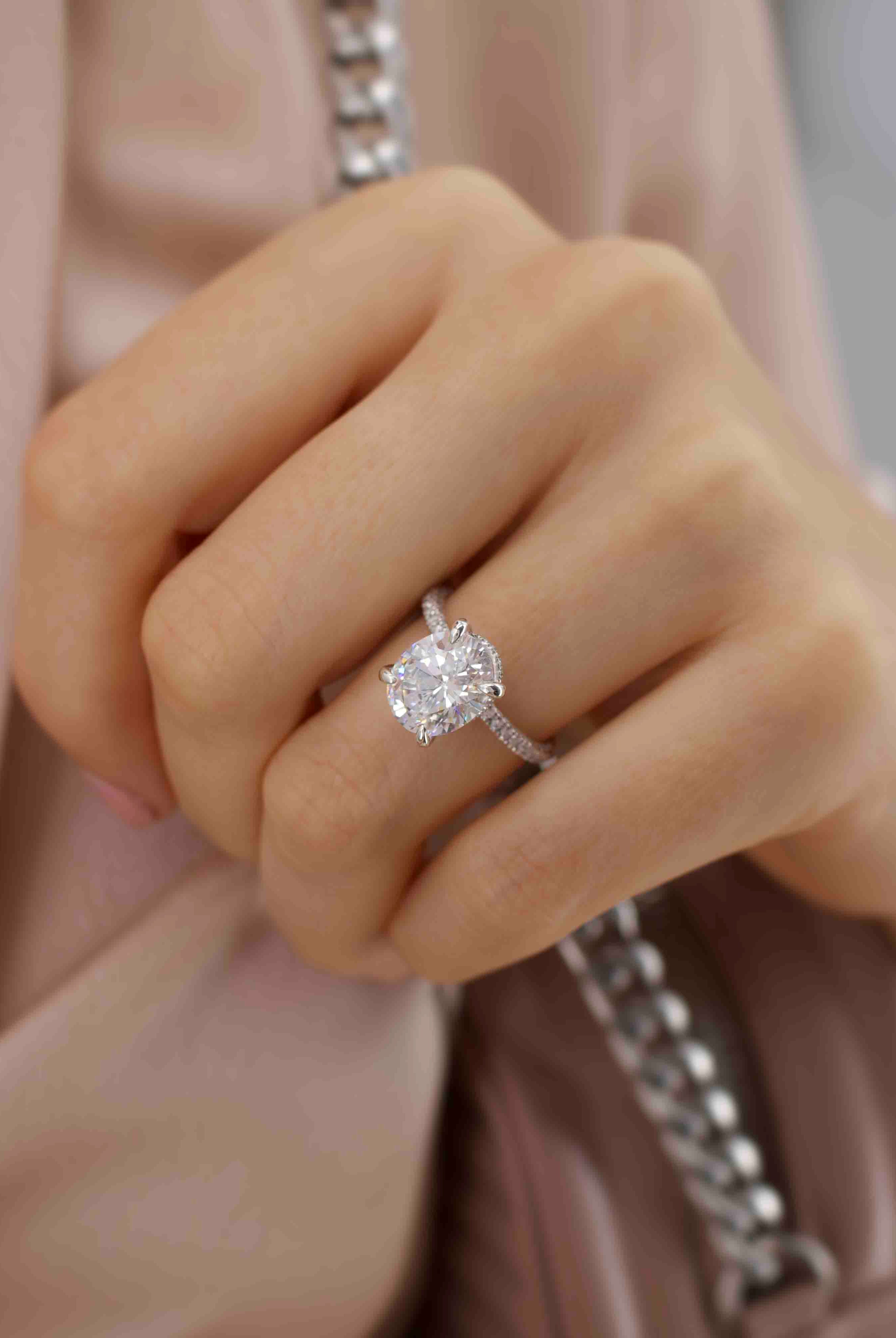 oval-shaped-moissanite-hidden-halo-engagement-ring