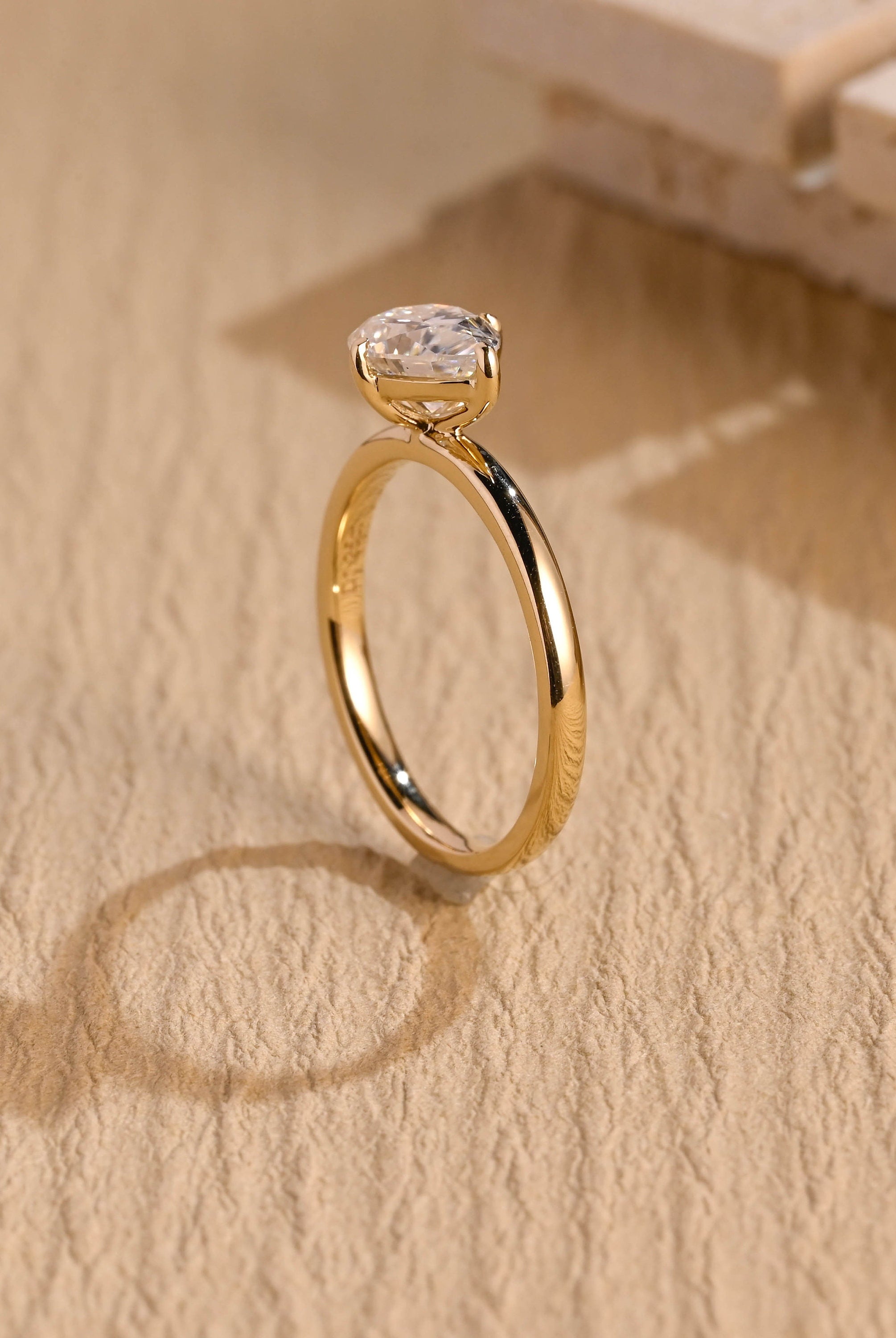 designer east west pear solitaire moissanite ring