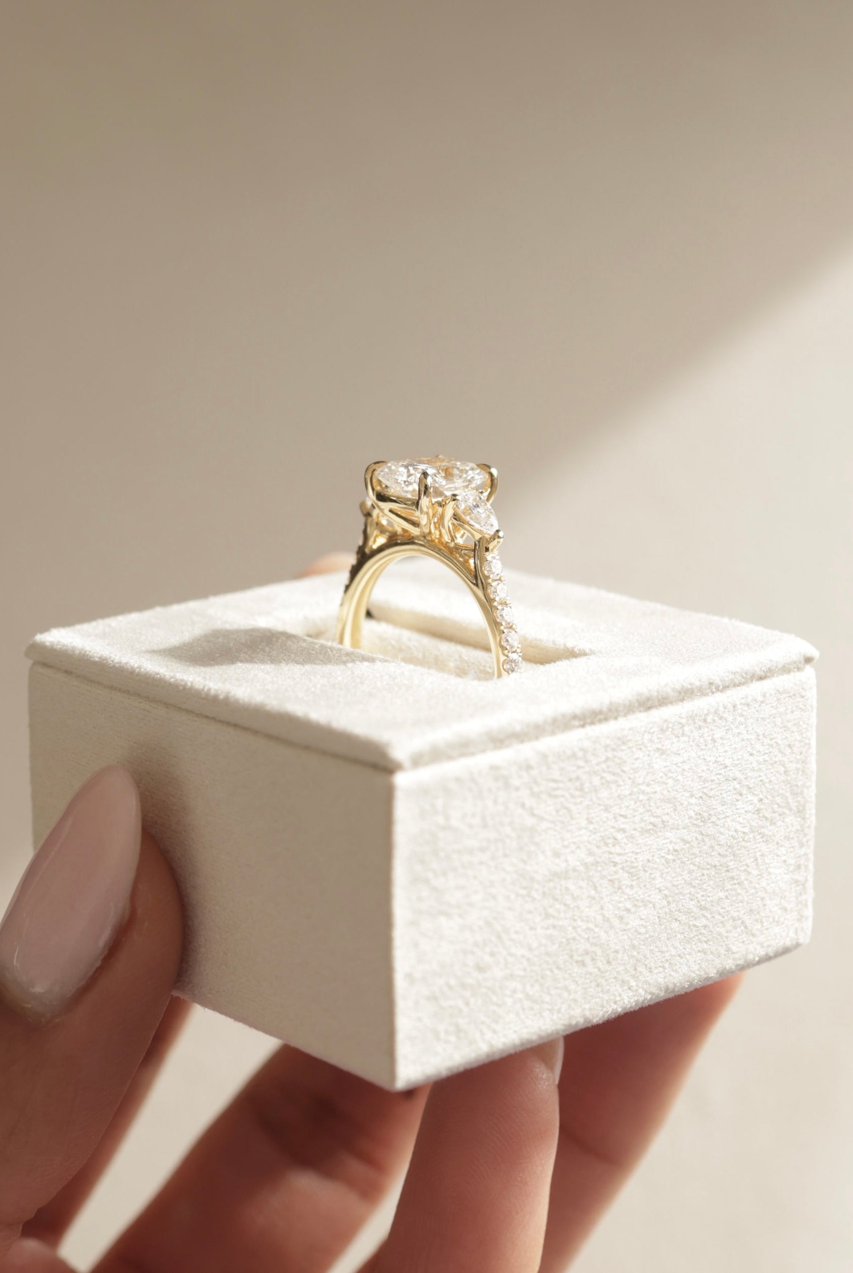 Elegant Three Stone Elongated Cushion Cut Ring