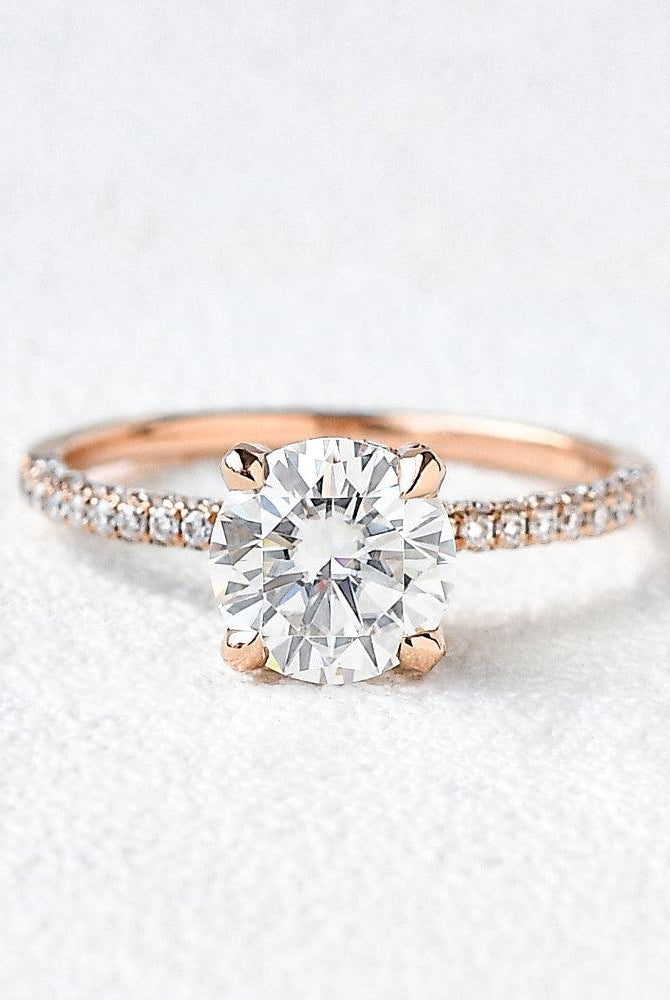 round-cut-solitaire-pave-moissanite-engagement-ring