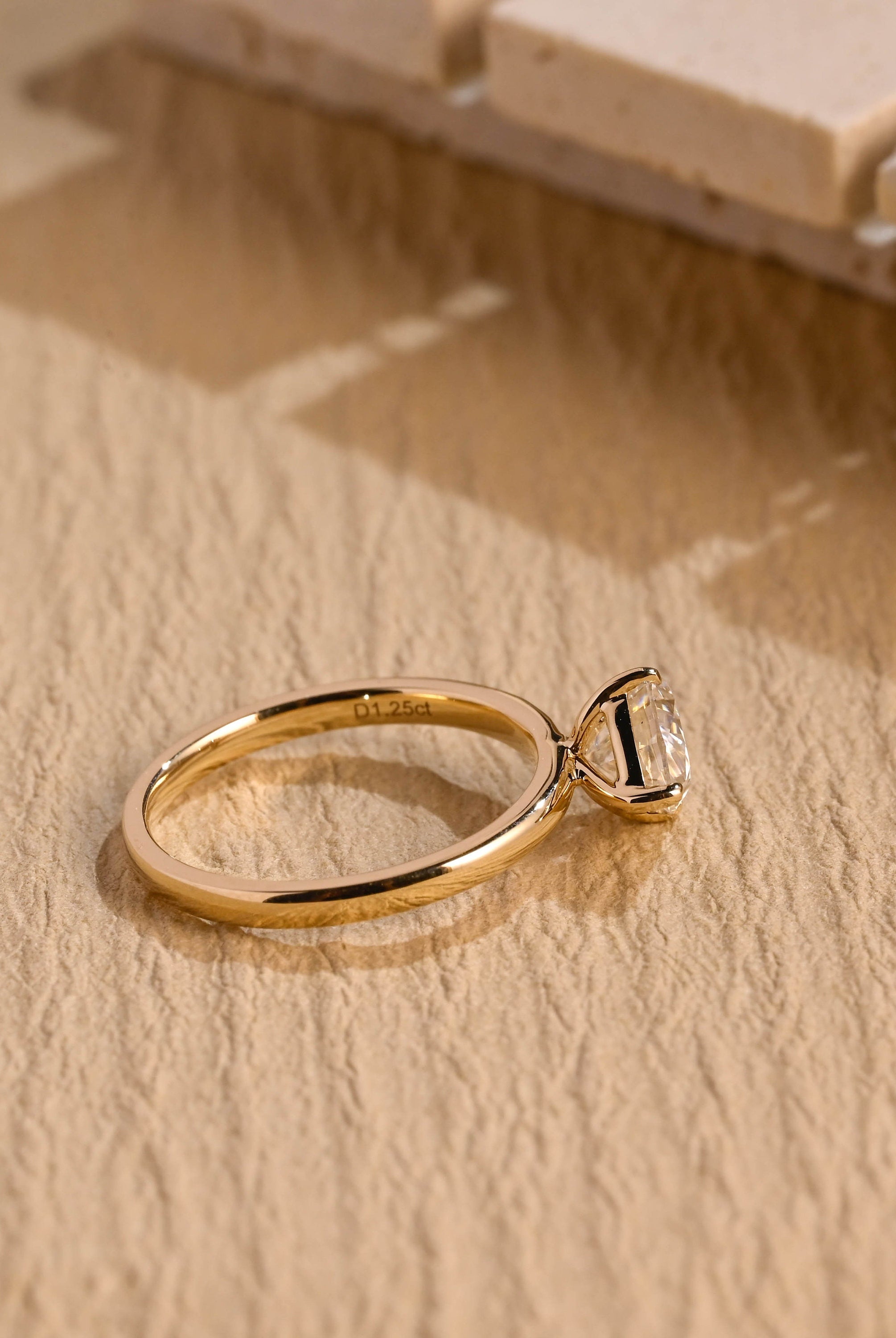 sustainable east west pear engagement ring moissanite
