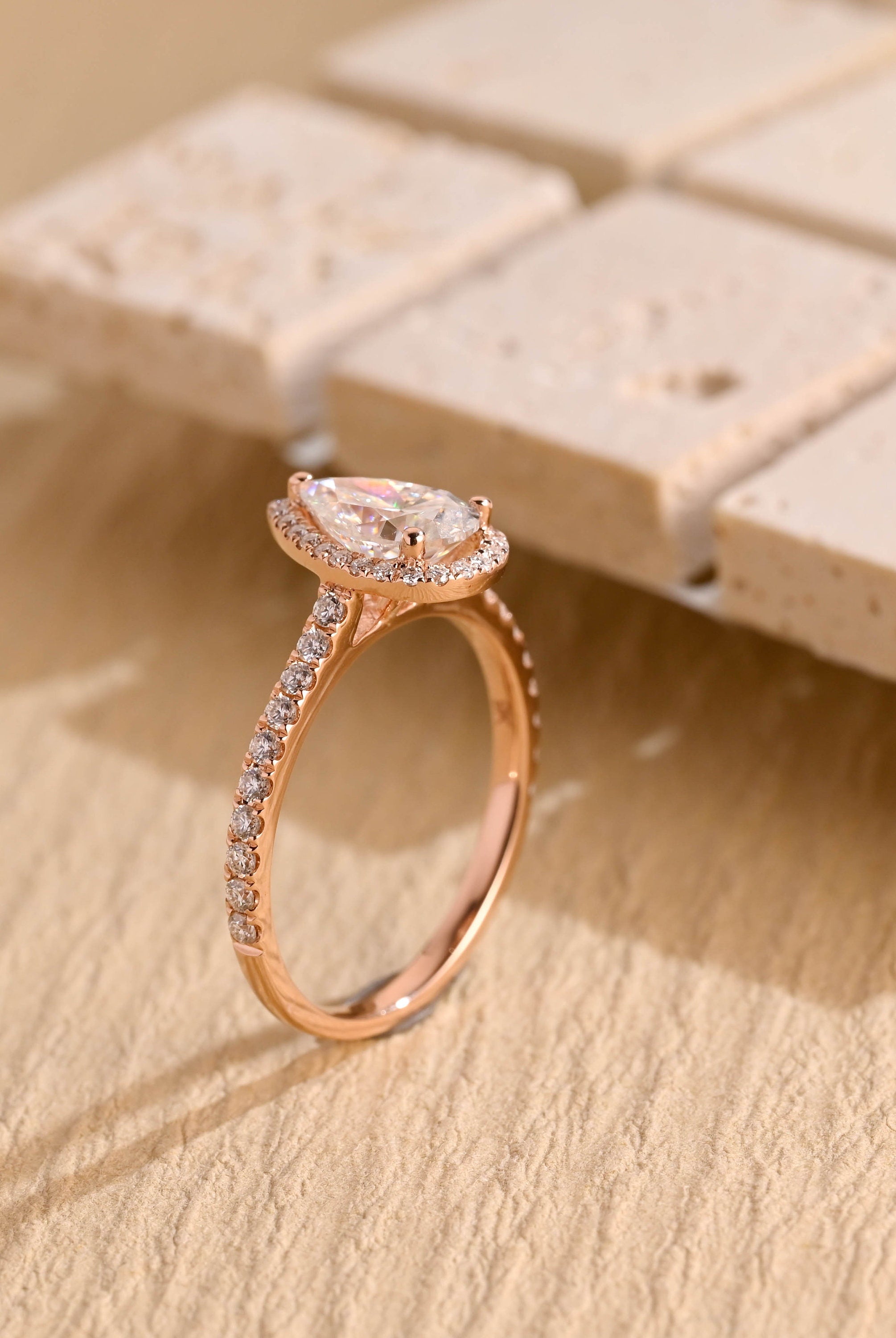 modern pear halo engagement ring USA