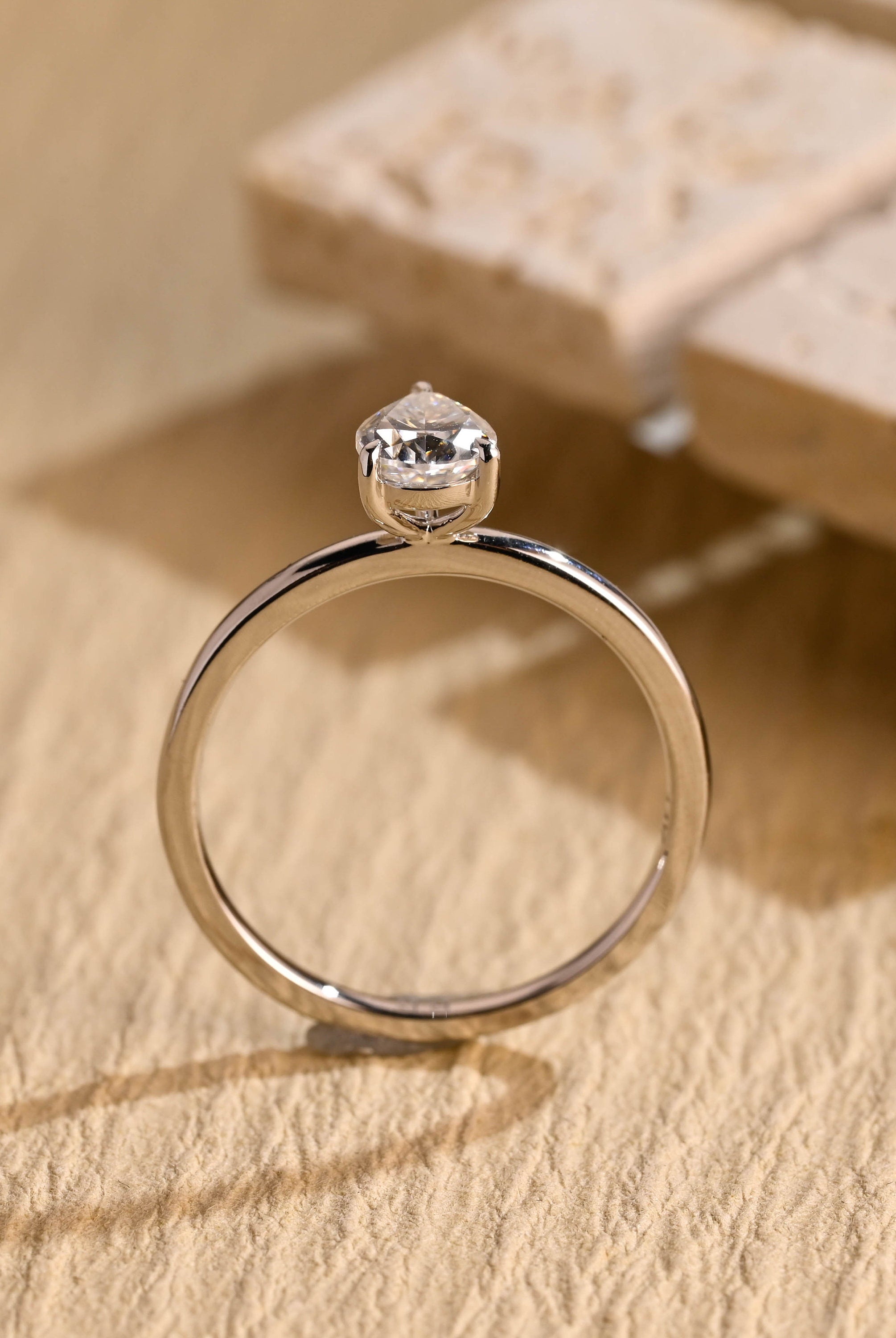 elegant pear cut solitaire engagement ring