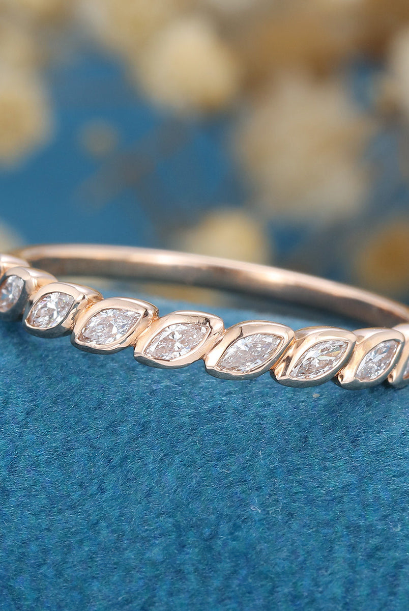 marquise-shaped-moissanite-bezel-half-eternity-wedding-band