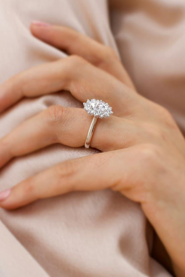oval-shaped-moissanite-halo-style-engagement-ring-3