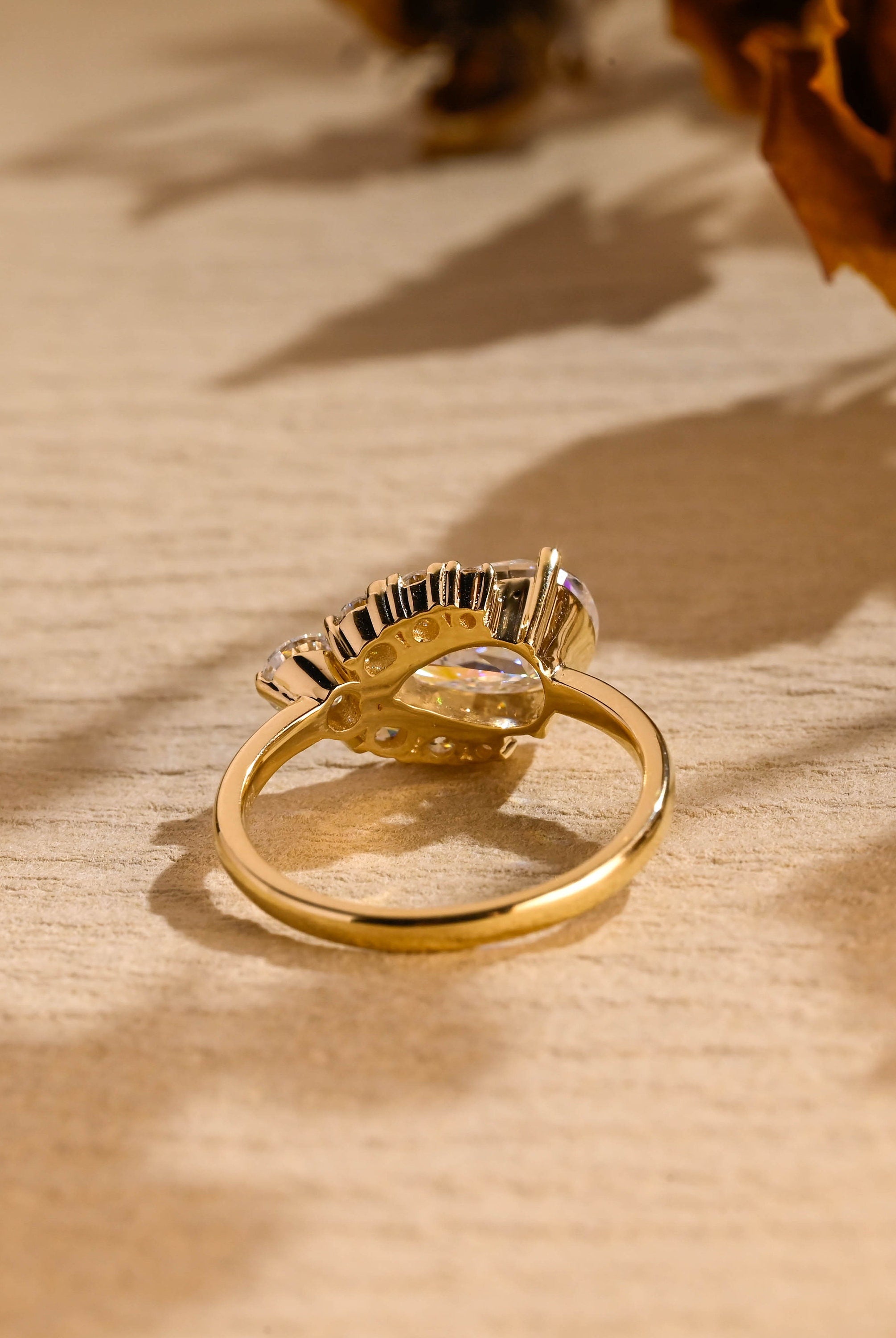 pear cut cluster moissanite engagement ring