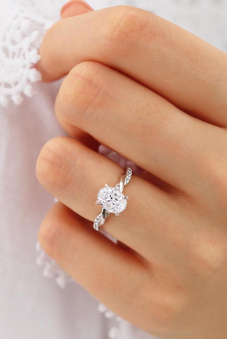 1-50-ct-oval-shaped-moissanite-solitaire-twisted-style-engagement-ring-3