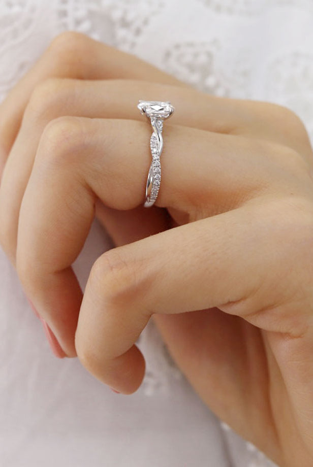 oval-shaped-moissanite-solitaire-twisted-style-engagement-ring-4