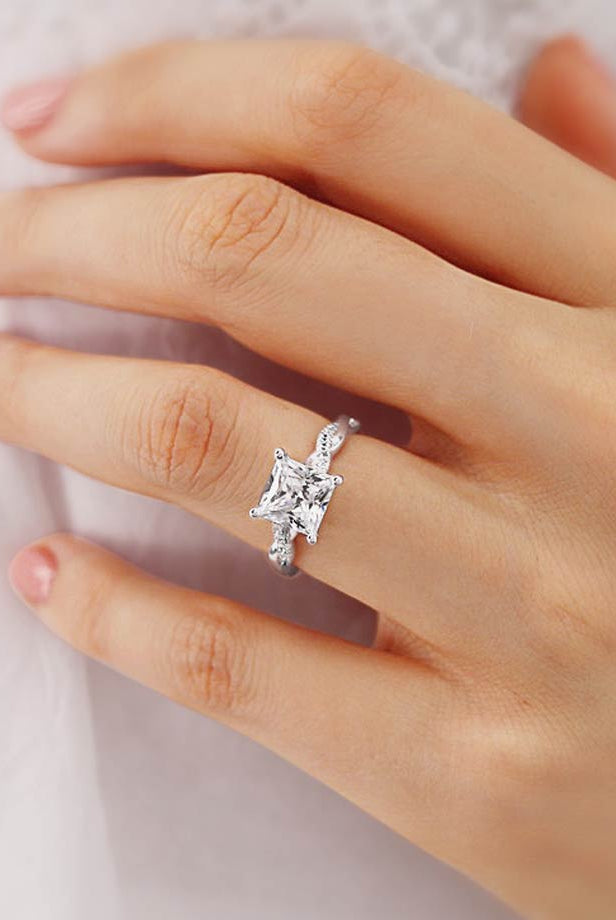 princess-shaped-moissanite-solitaire-twisted-style-engagement-ring
