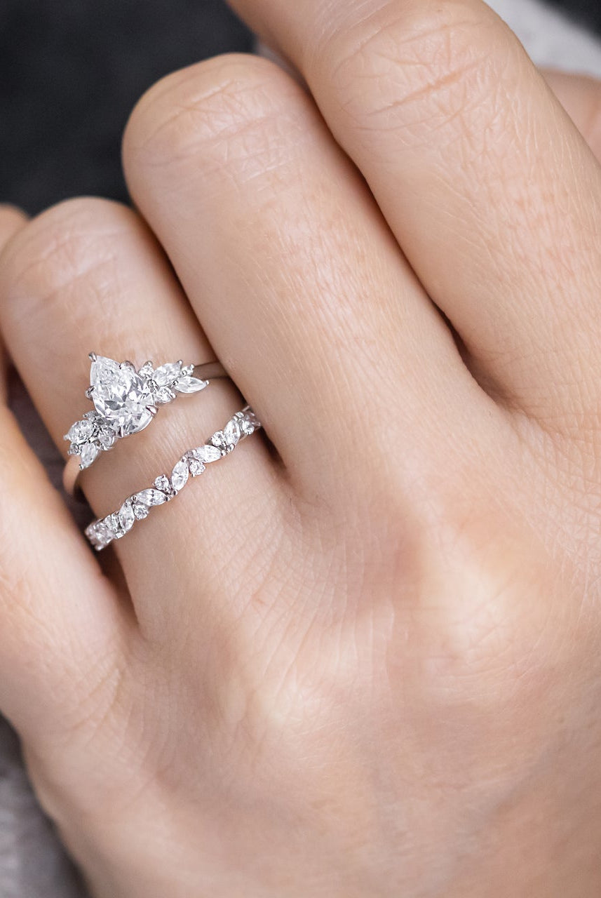 Elegant 1.33CT Pear Cut Moissanite Cluster Ring