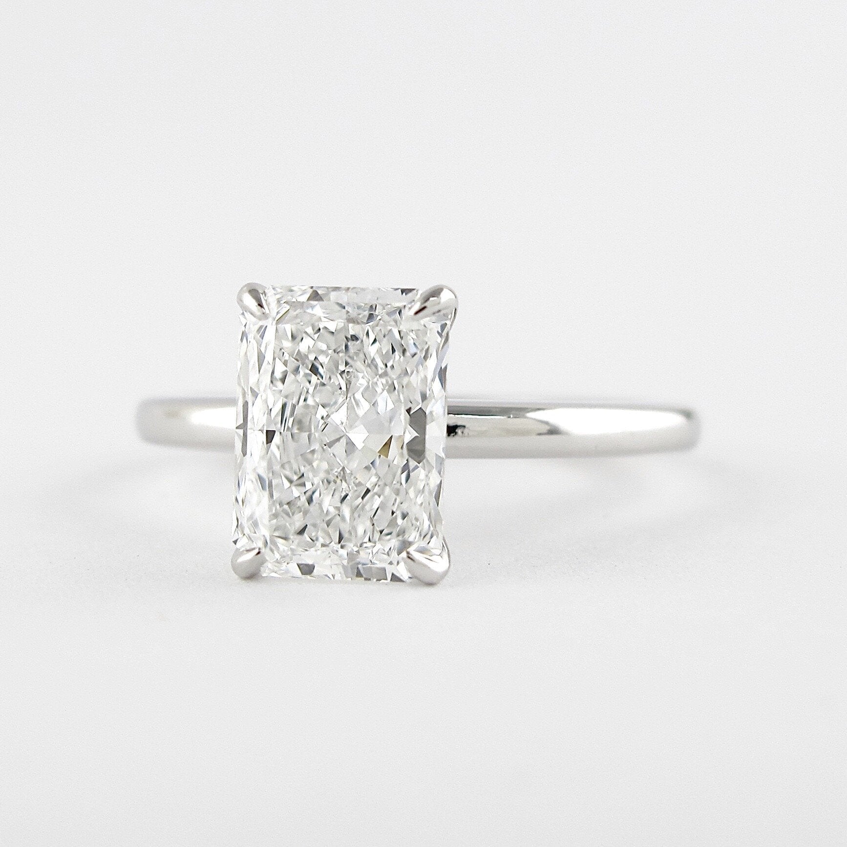 Four Prong Solitaire Ring