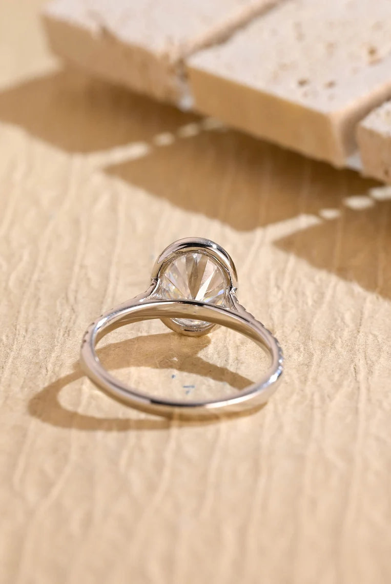 Elegant Oval Diamond Ring with Bezel Setting