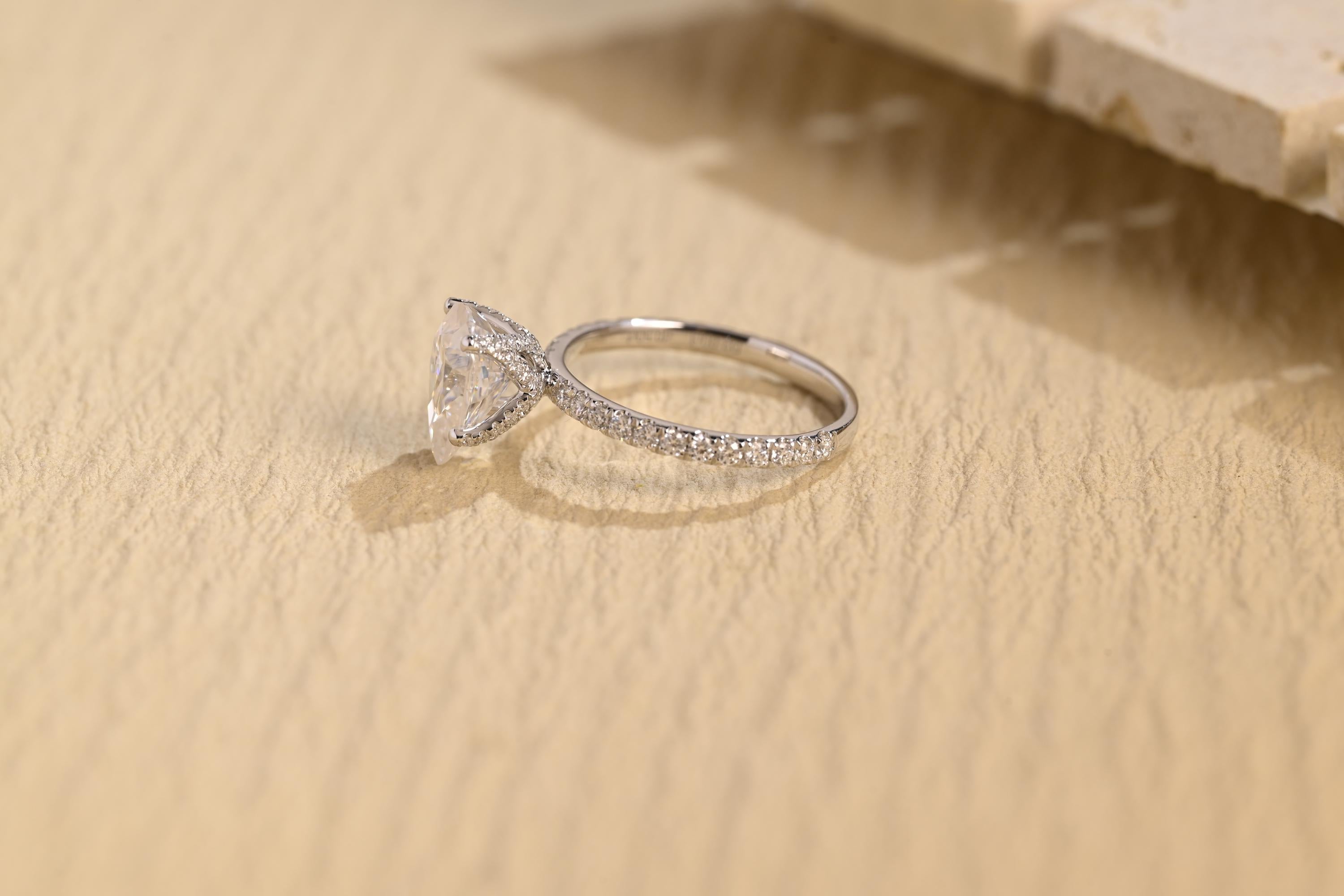 1 carat pear moissanite pavé engagement ring