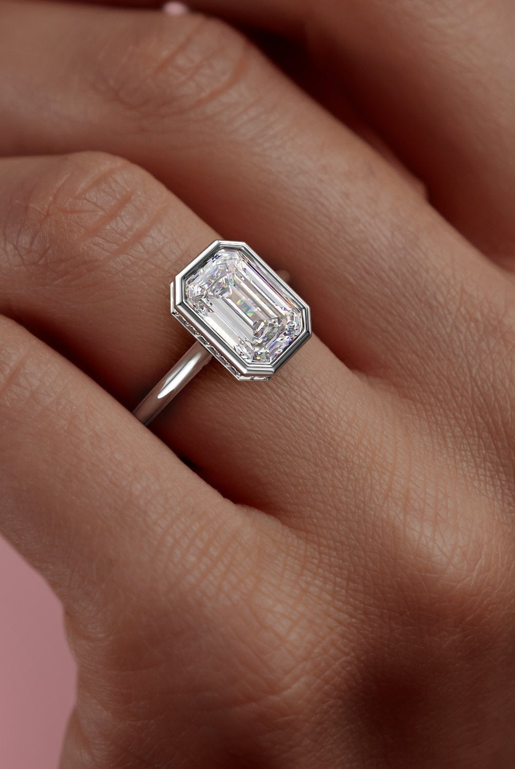 emerald-cut-bezel-solitaire-moissanite-engagement-ring