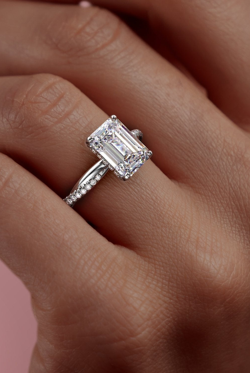 emerald-cut-solitaire-twisted-pave-moissanite-engagement-ring