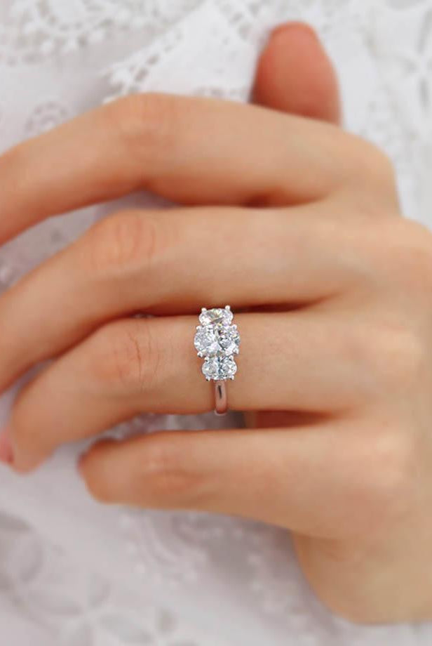 1-5-ct-oval-shaped-moissanite-three-stone-engagement-ring