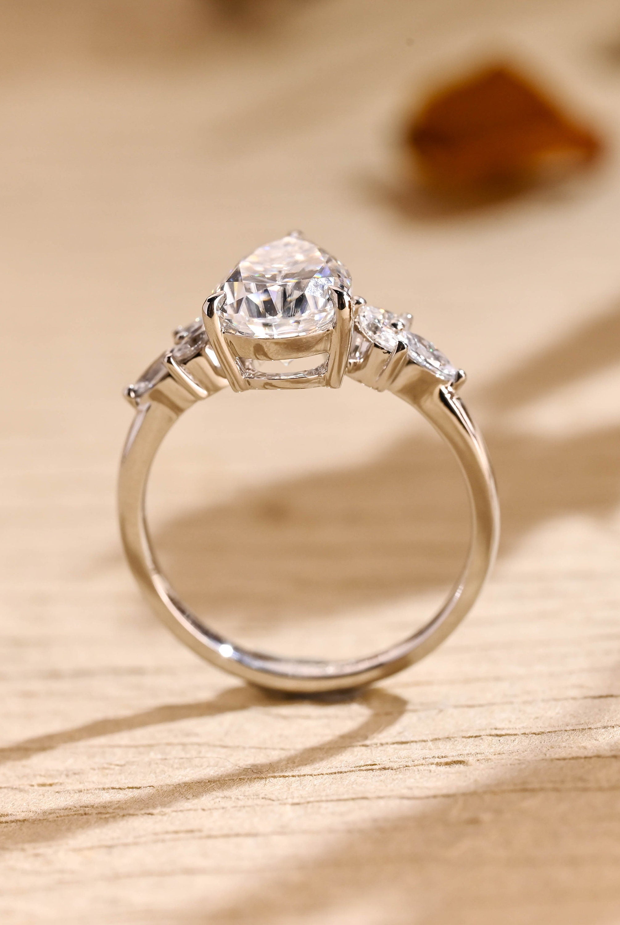 designer pear cluster moissanite engagement ring