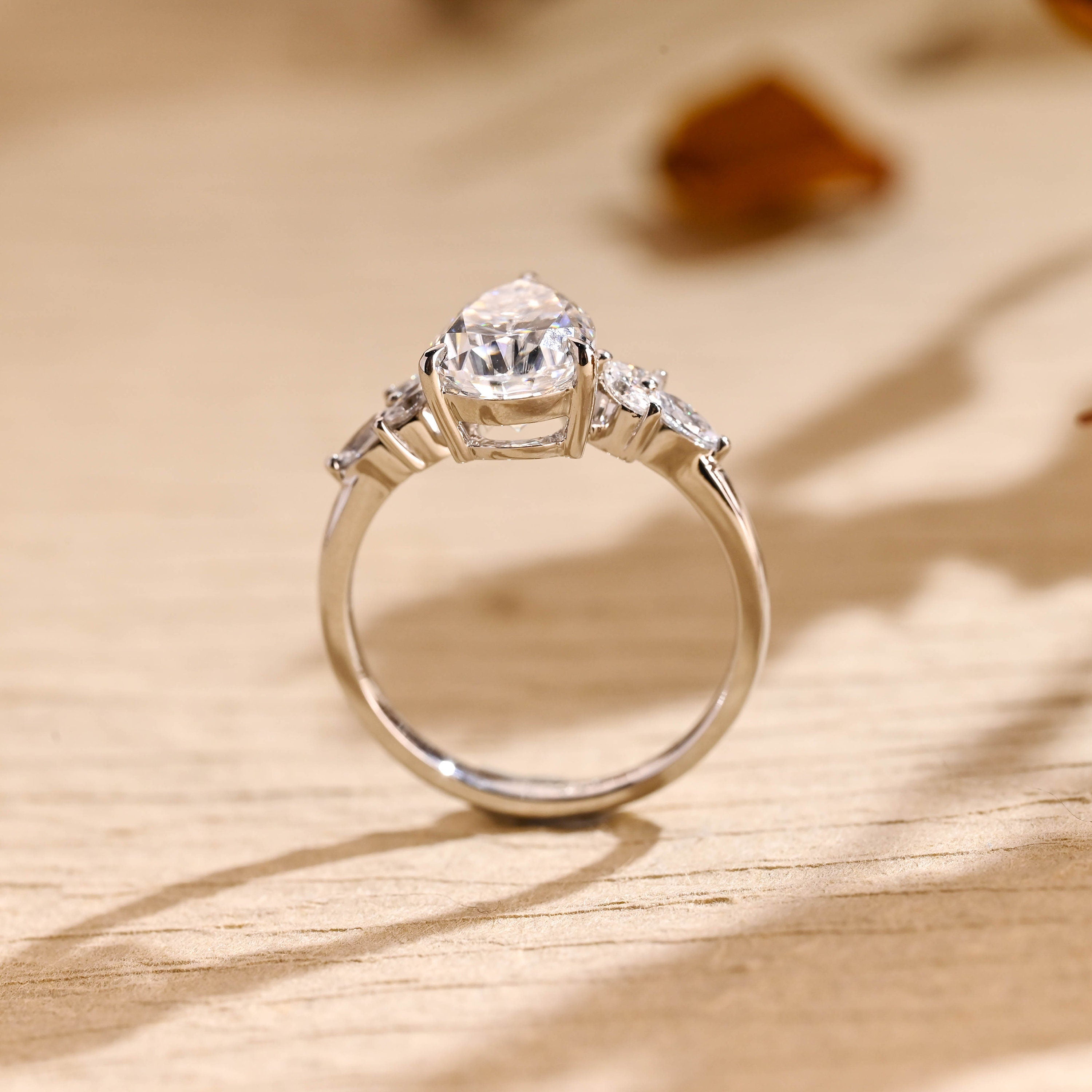 designer pear cluster moissanite engagement ring