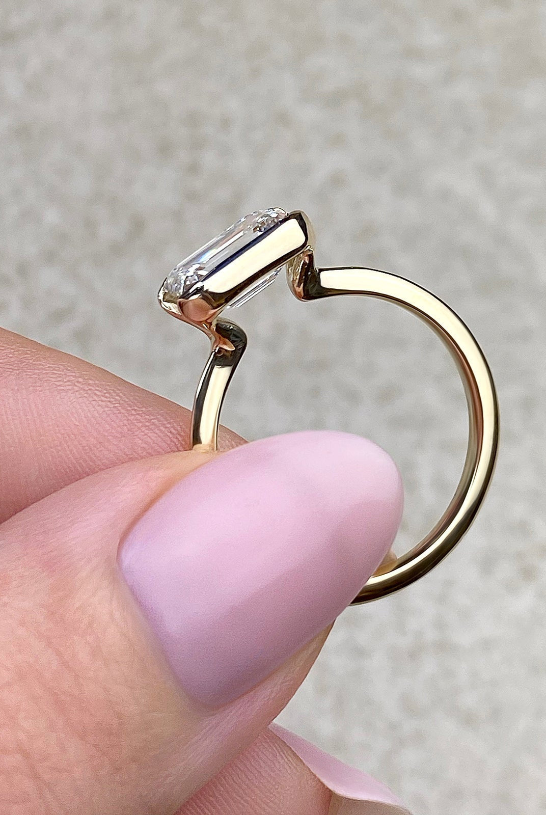 Solitaire Emerald Cut Ring