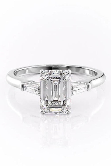 emerald-cut-three-stone-moissanite-engagement-ring
