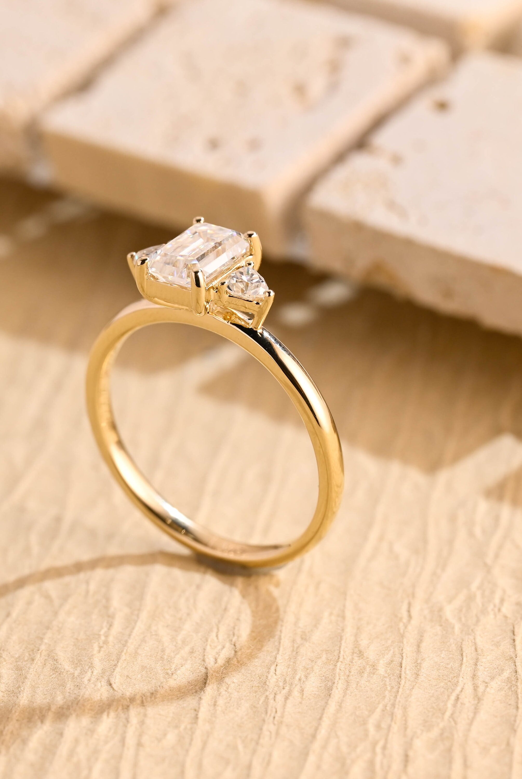 Buy Emerald Cut Three Stone Moissanite Ring