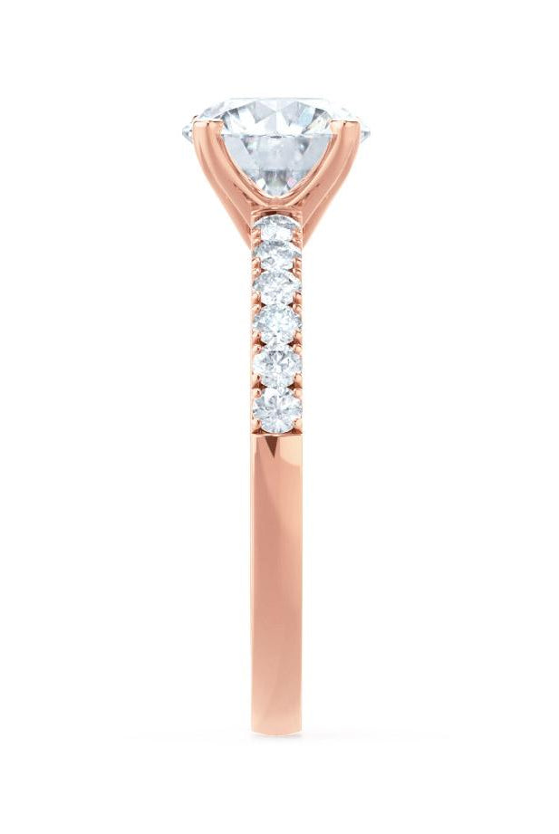round-shaped-moissanite-solitaire-with-pave-setting-engagement-ring