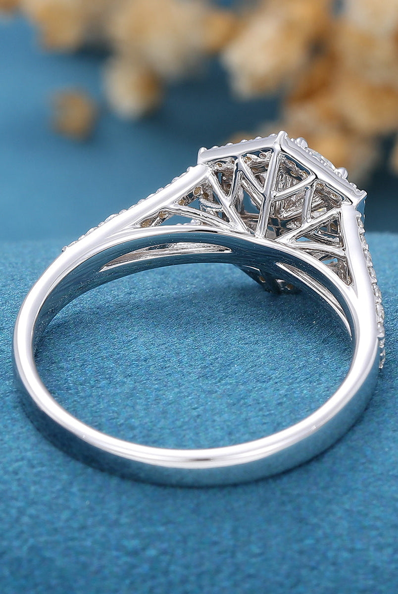 0-68-ct-round-shaped-moissanite-double-halo-split-shank-engagement-ring