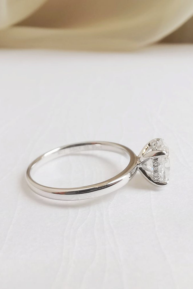 1-50-ct-oval-shaped-moissanite-hidden-halo-engagement-ring