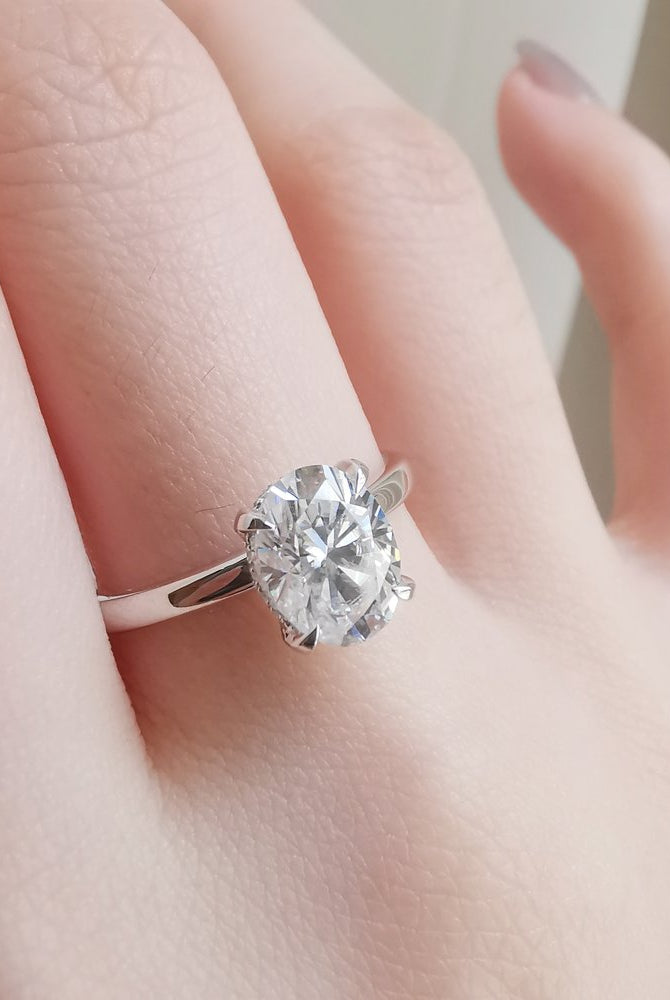 1-50-ct-oval-shaped-moissanite-hidden-halo-engagement-ring