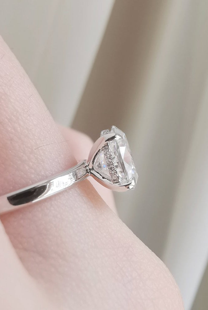 1-50-ct-oval-shaped-moissanite-hidden-halo-engagement-ring
