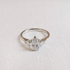1-50-ct-pear-shaped-moissanite-three-stone-engagement-ring