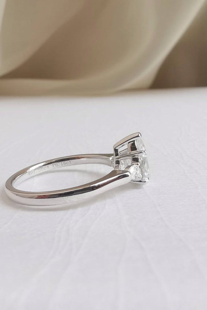 1-50-ct-pear-shaped-moissanite-three-stone-engagement-ring