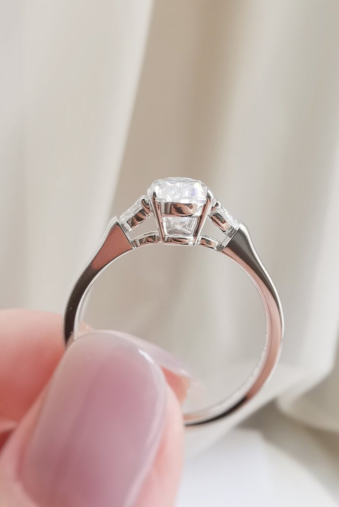 1-50-ct-pear-shaped-moissanite-three-stone-engagement-ring