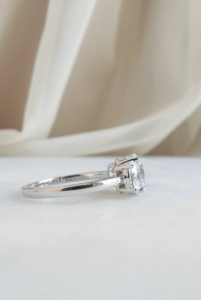 1-50-ct-oval-shaped-moissanite-three-stone-engagement-ring