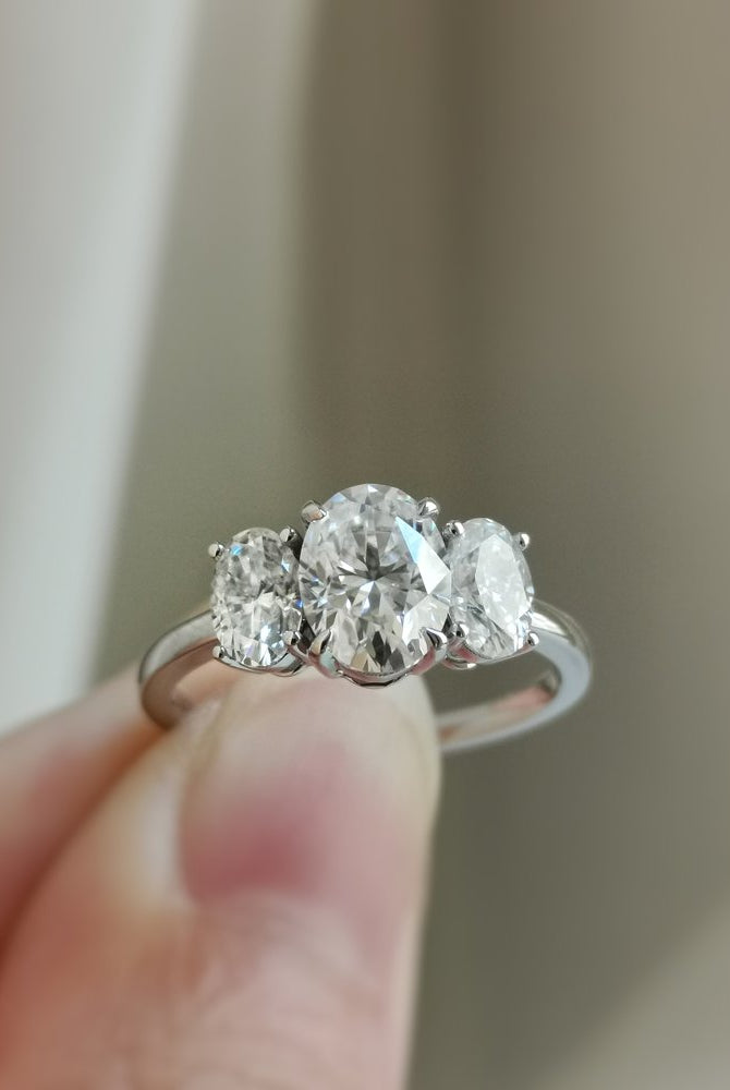 1-50-ct-oval-shaped-moissanite-three-stone-engagement-ring