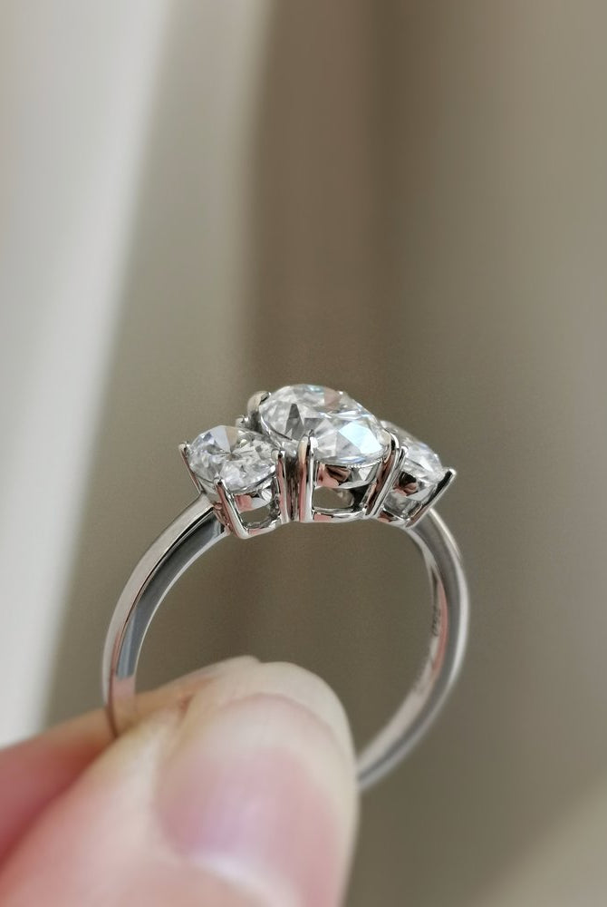 1-50-ct-oval-shaped-moissanite-three-stone-engagement-ring