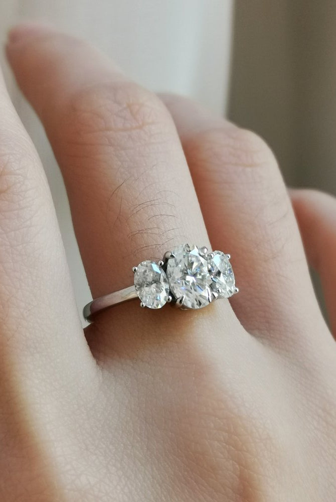 1-50-ct-oval-shaped-moissanite-three-stone-engagement-ring